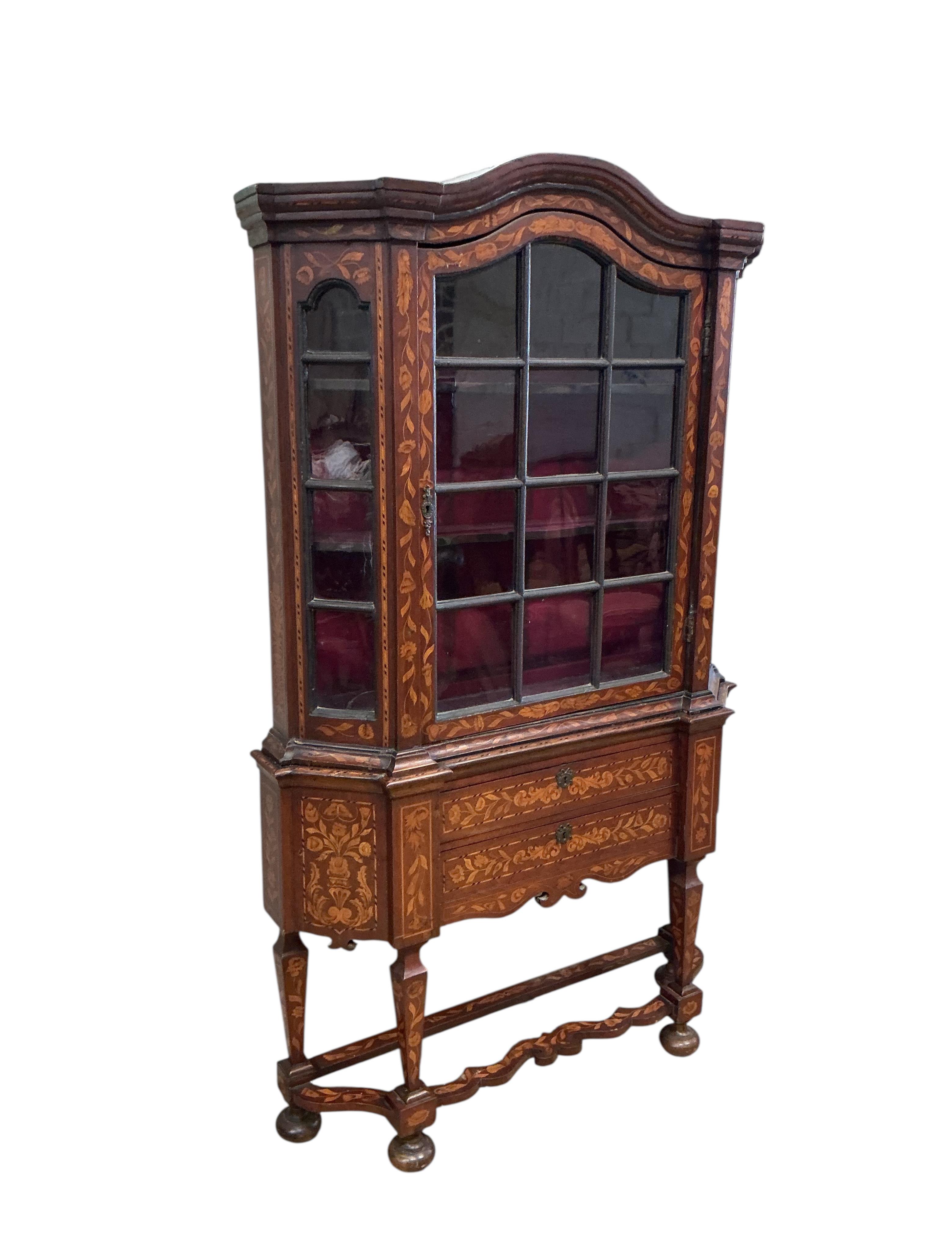 A late 18th / early 19th century Dutch floral marquetry walnut display cabinet, width 116cm, depth 30cm, height 196cm